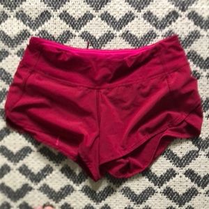 Pink lululemon running shorts size 4